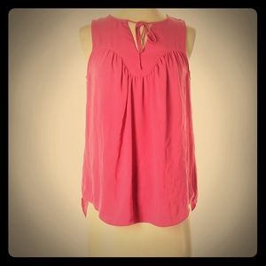 Pink sleeveless blouse